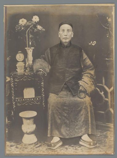 Portrait of an unknown seated Chinese man
