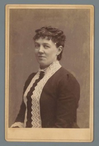 Portrait of a woman with a strip of lace on her dress