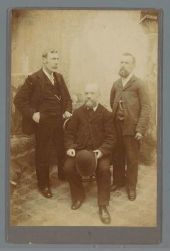 Group portrait of three men