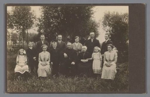 Family portrait in a garden with trees