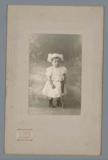 Portrait of a girl with a tennis racket