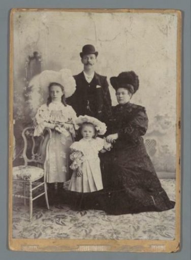 Family portrait with a man, a woman, and two girls