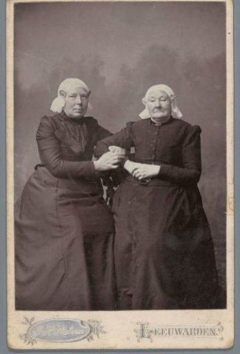 Portrait of two unknown women in Frisian traditional dress