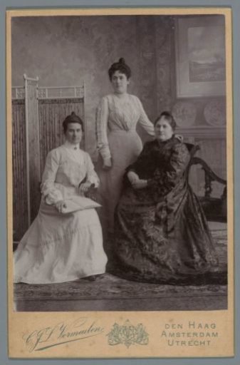 Studio portrait of three unknown women