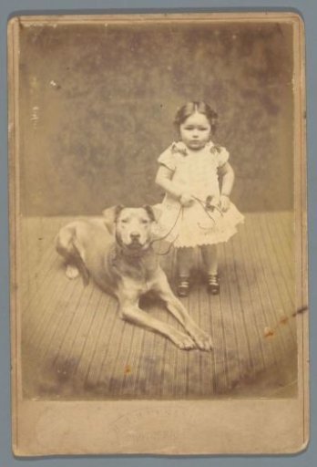 Portrait of an unknown girl with a dog