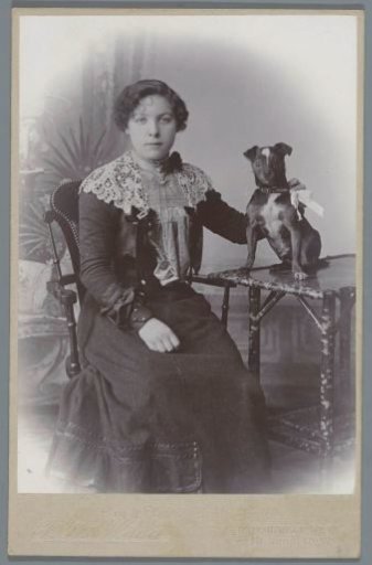 Portrait of an unknown woman with a dog
