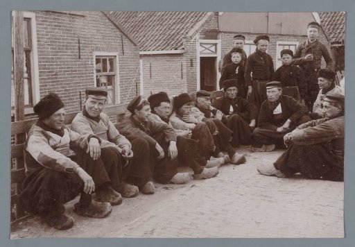 Group Portrait of Men in Traditional Dress in Muiden