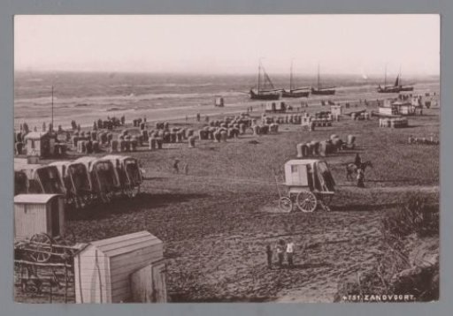 Seaside view with covered wagons and wicker beach chairs at Zandvoort