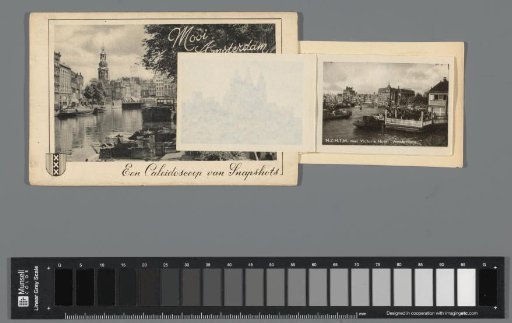 View of the Victoria Hotel on the Damrak in Amsterdam