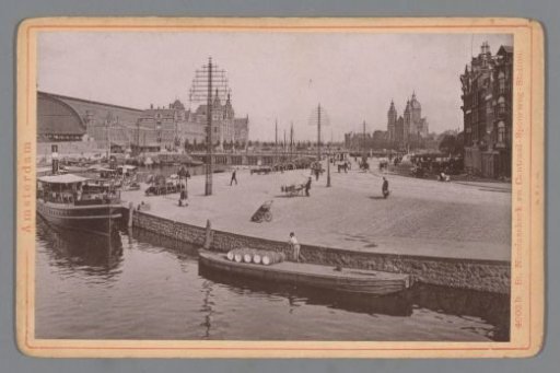 View of the Central Station and the Saint Nicholas Church in Amsterdam