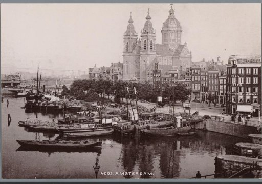 View of the Prins Hendrikkade and the Saint Nicholas Church in Amsterdam