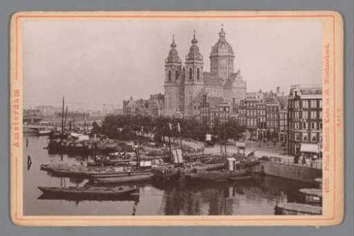 View of the Prins Hendrikkade and the Saint Nicholas Church in Amsterdam