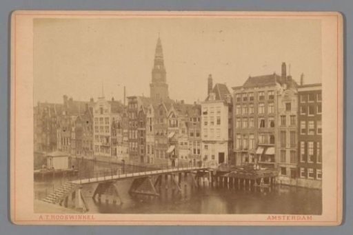View of the Damrak, the Papenbrug and Papenbrugsteeg in Amsterdam