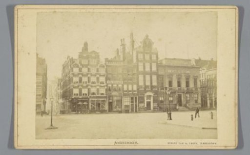 View of the Dam with the cigar shop of the Brothers van Haagen and the Royal College Zeemanshoop in Amsterdam, with the Beurssteeg on the left side