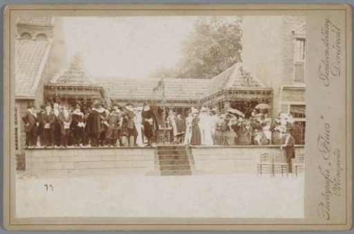 Group of people in seventeenth-century clothing on a stage during the Exhibition of Craft and Art in 1897 in Dordrecht