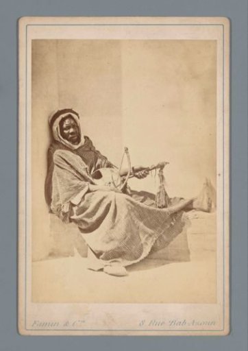 Black man with musical instrument