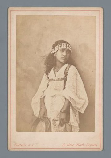 Portrait of an unknown young woman with tambourine