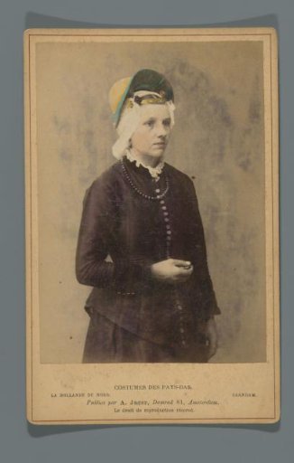 Portrait of an unknown woman with headdress according to the costume of Zaandam, North Holland