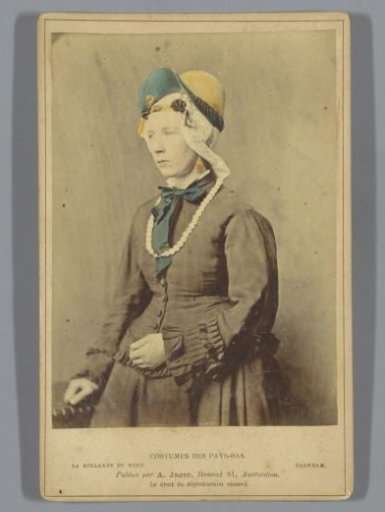 Portrait of an unknown woman with headdress according to the costume of Zaandam, North Holland