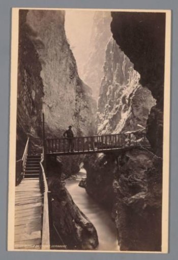 View of the Gorges du Trient near Vernayaz in Switzerland with a man on a bridge