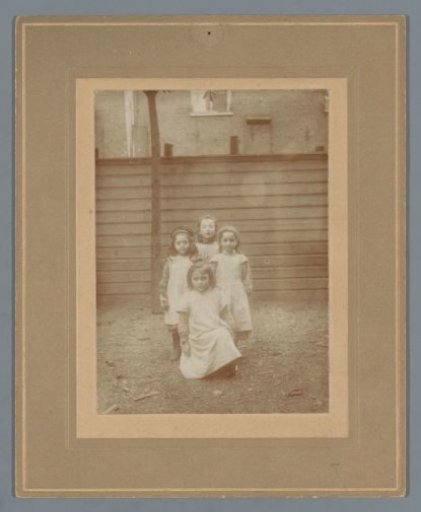 Portrait of Four Unknown Girls in a Backyard