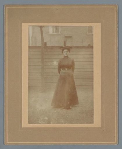 Portrait of an Unknown Woman in a Backyard