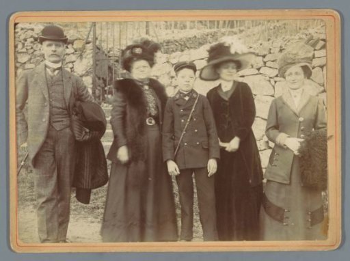 Portrait of an Unknown Family Before a Stone Wall