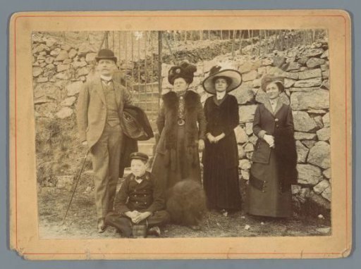 Portrait of an Unknown Family Before a Stone Wall
