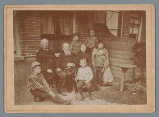 Group Portrait of an Unknown Family in a Backyard