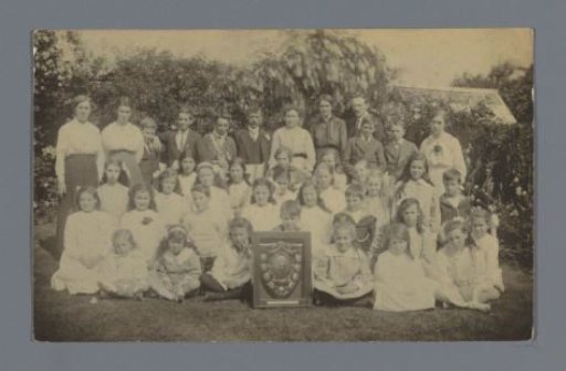 Group portrait of (presumably) pupils and their teachers