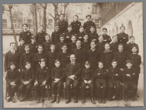 Portrait of a Group of Unknown Boys and Several Unknown Men