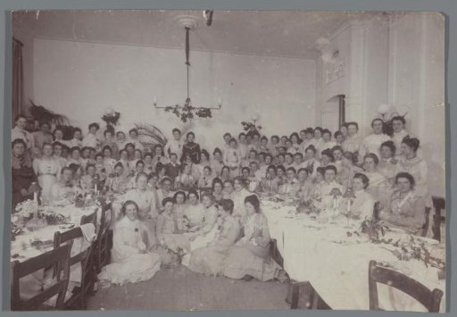 Group Portrait of Unknown Members of a Society Around a Set Table