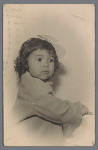 Portrait of an unknown child with a cap