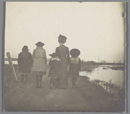 Mother with four girls in a polder along the Rotte