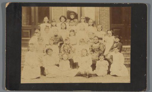 Group portrait of an unknown school class with boys and girls