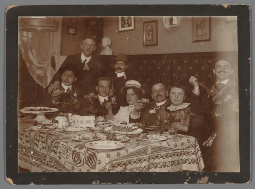Group Portrait of Six Unknown Celebrating Young Men and Two Women, in Hotel Scheltema, Amsterdam