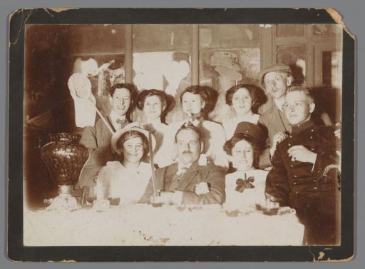 Group Portrait of Nine Unknown Young Men and Women in Hotel Scheltema, Amsterdam