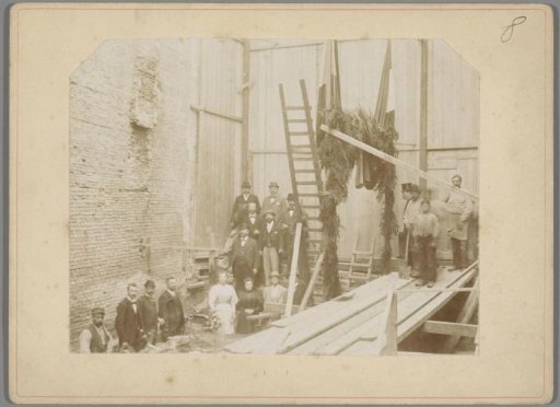 Laying of the foundation stone of the hotel Palais Royal at the corner of the Paleisstraat and the Nieuwezijds Voorburgwal