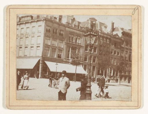 View of the corner of Paleisstraat and Nieuwezijds Voorburgwal in Amsterdam