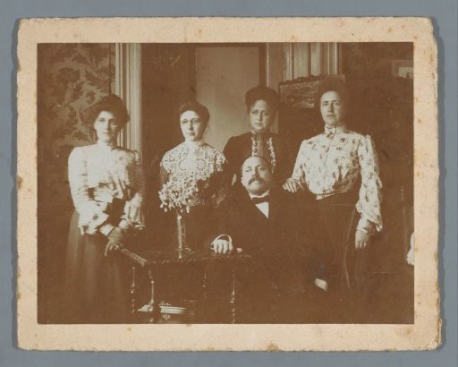 Group Portrait of Four Unknown Women and a Man in an Interior