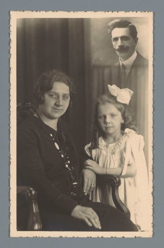 Portrait of an unknown woman and her daughter with an inserted portrait of an unknown man