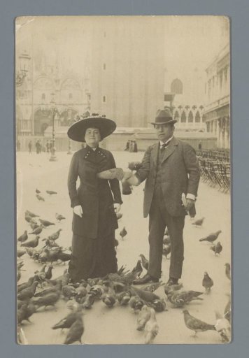 Portrait of an unknown man and woman with doves on the Piazza San Marco in Venice