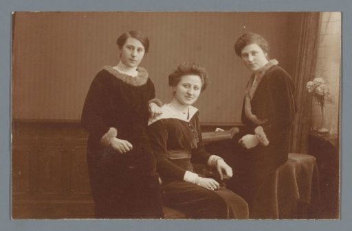 Studio portrait of three unknown women