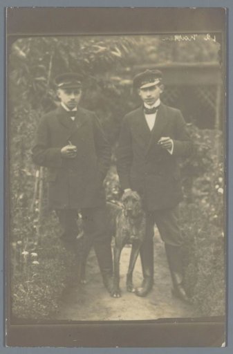 Portrait of Two Unknown Men with a Dog