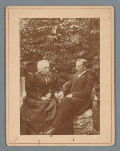 Portrait of an elderly couple in a garden