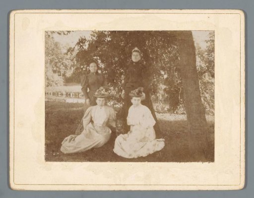 Portrait of four unknown women in a park