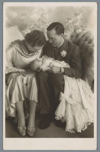 Unborn Princess Beatrix on the lap of Prince Bernhard and Princess Juliana