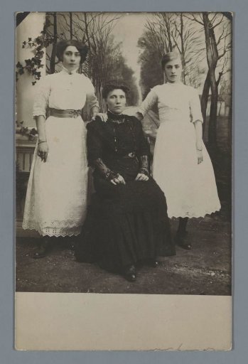 Studio portrait of three unknown women
