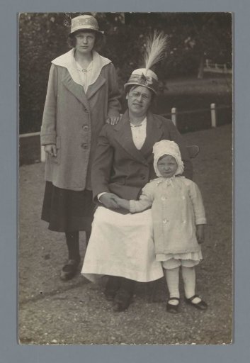 Portrait of Two Unknown Women and a Child in a Park