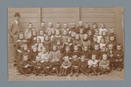 Group portrait of children and (presumably) teachers